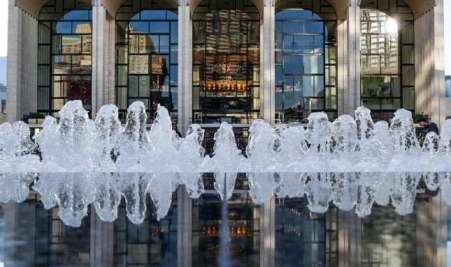 Settle into comfort at Two Lincoln Square a fountain with water shooting up