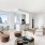 a large living room with a large window