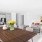 a large living room with a dining table and chairs