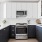 a kitchen with white cabinets